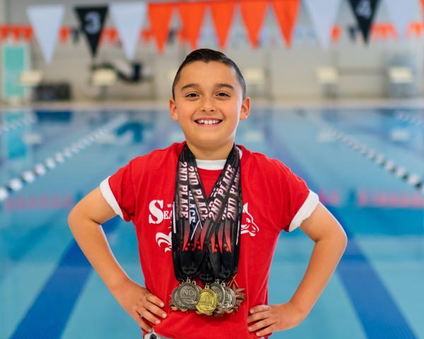 Eight-year-old becomes Seawolves first state swim champ