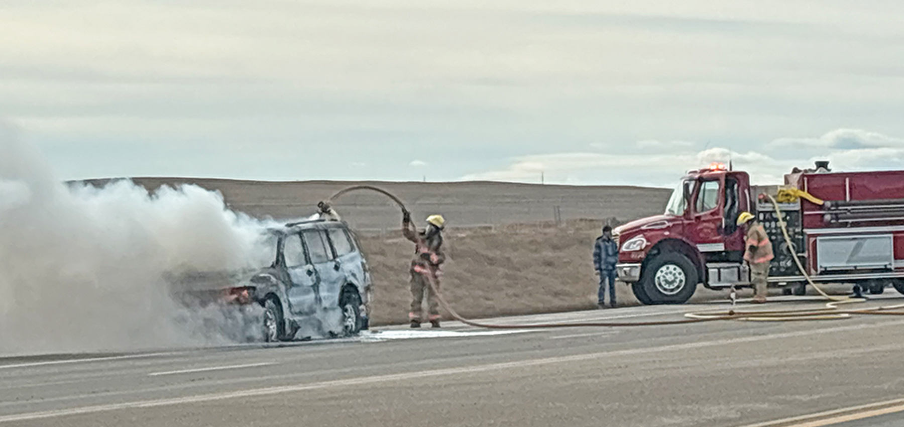 SUV destroyed in roadside blaze