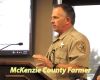 Sheriff extends hand on return to county meeting