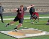 Boys track team powers through the weather